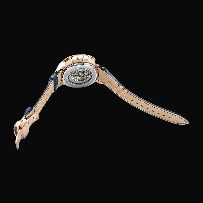 Luxury watch with rose gold case and blue strap on a white background
