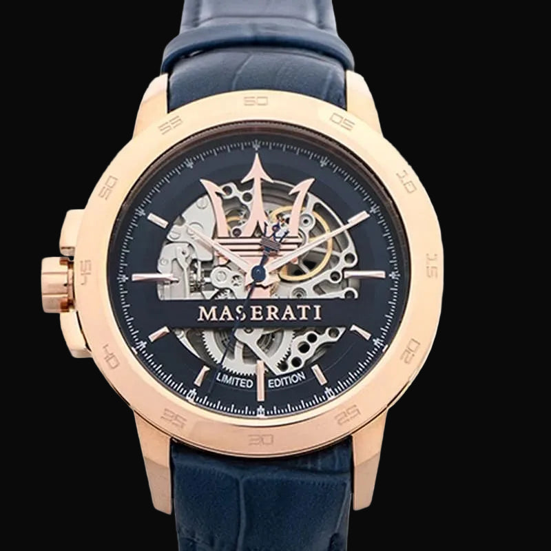 Maserati watch with rose gold case and blue strap on a white background
